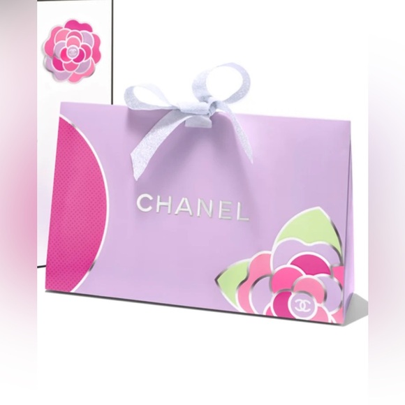CHANEL Handbags - CHANEL Gift Bag Limited Edition w/ ribbon,tissue paper, camilla charm
